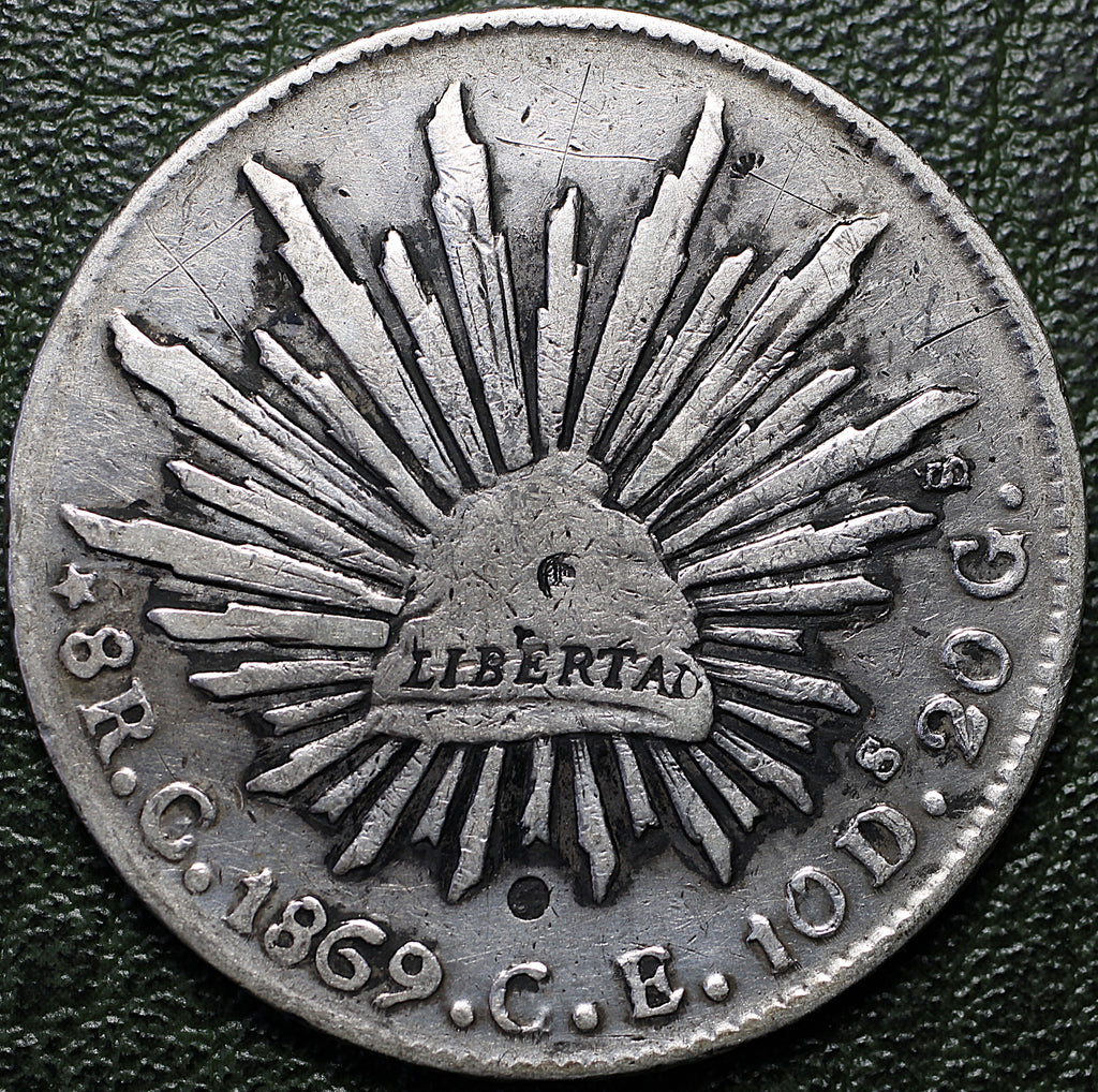 República Mexicana 8 Reales 1869 C CE - Resplandor (Caps & Rays) - Ceca Culiacán - Escasa - Plata