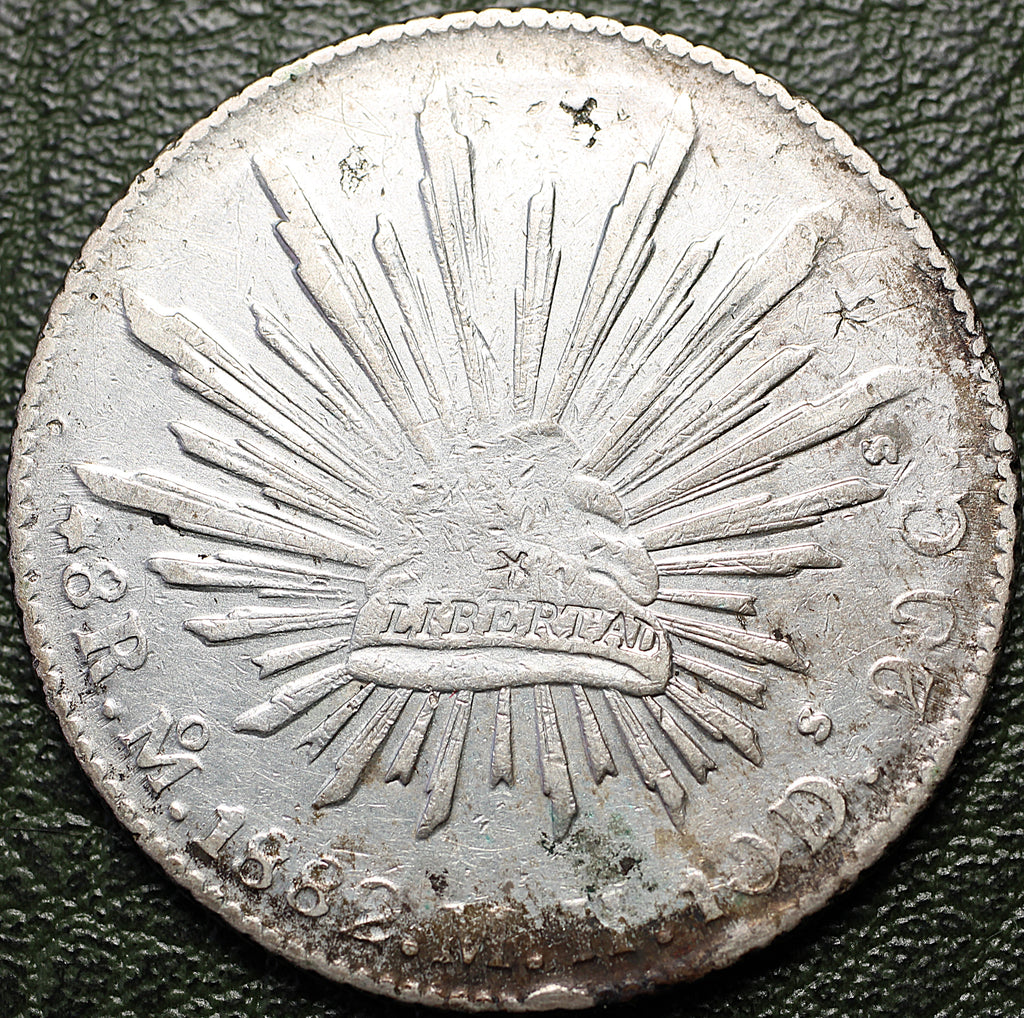 8 REALES DE PLATA 1882 Mo MD CON RESELLOS CHINOS (CHOPMARKS) — REPÚBLICA MEXICANA