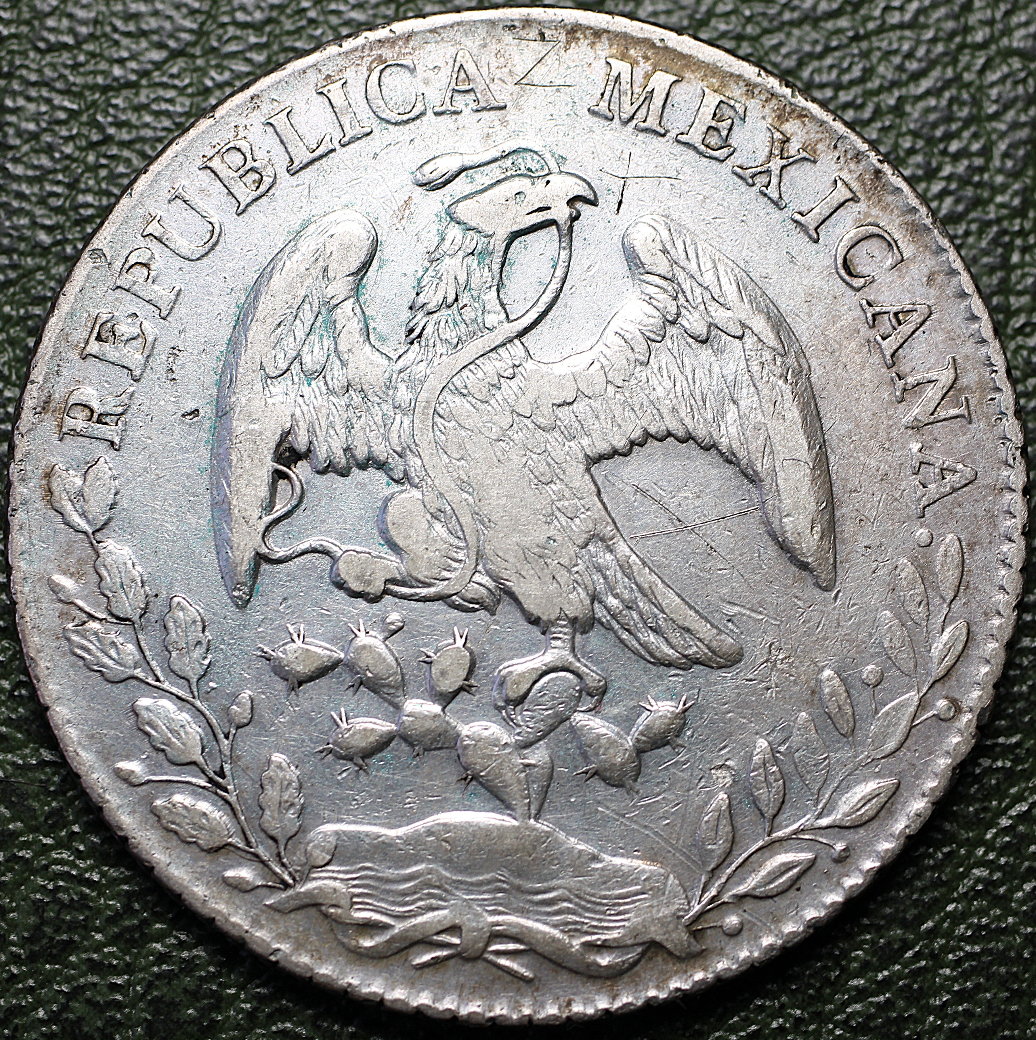 8 REALES DE PLATA 1882 Mo MD CON RESELLOS CHINOS (CHOPMARKS) — REPÚBLICA MEXICANA